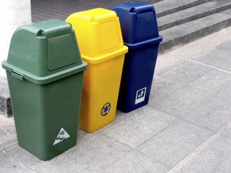 Professional team managing builders waste in Fitzrovia